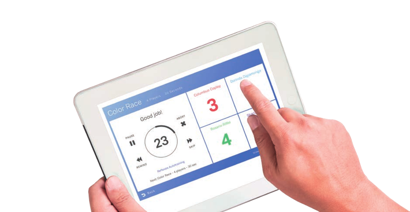 A hand selecting a game in the MOTO app on a tablet