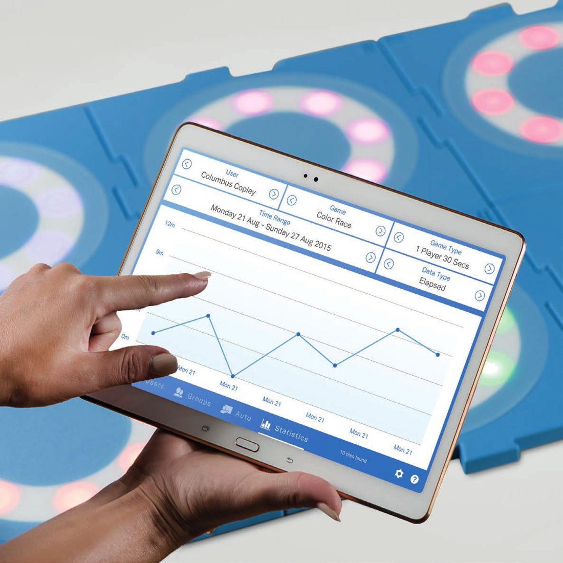A tablet showing a player's progress graph