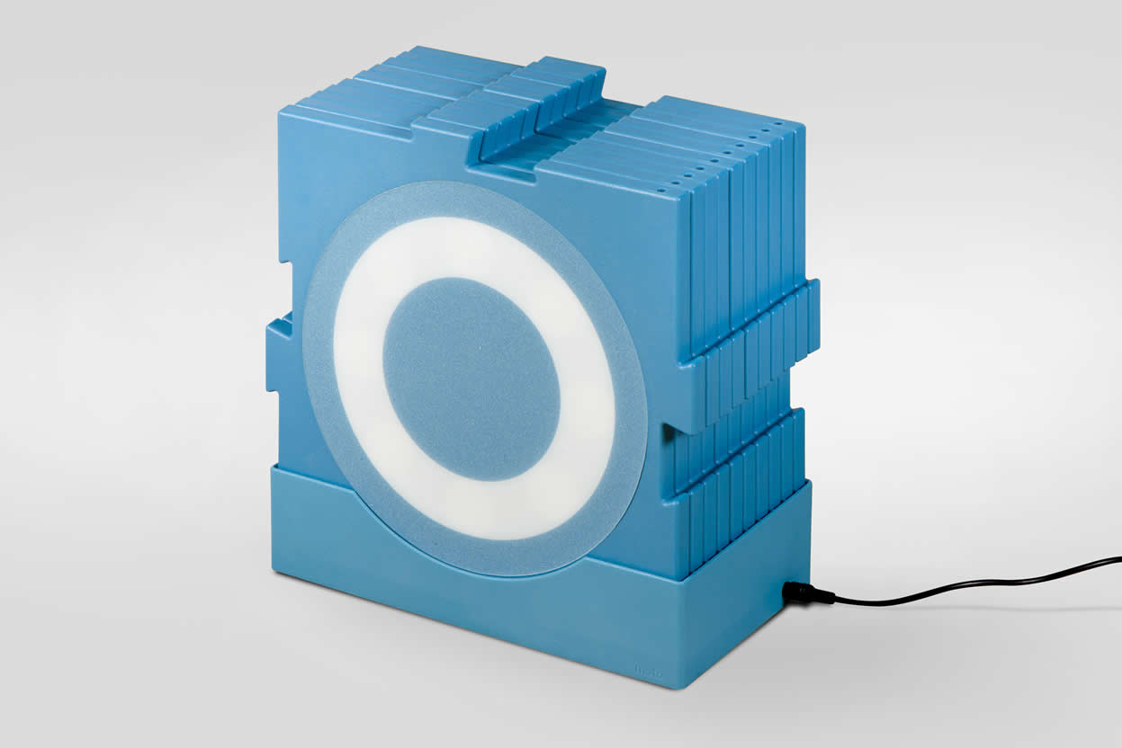 The MOTO charging station with tiles stacked inside